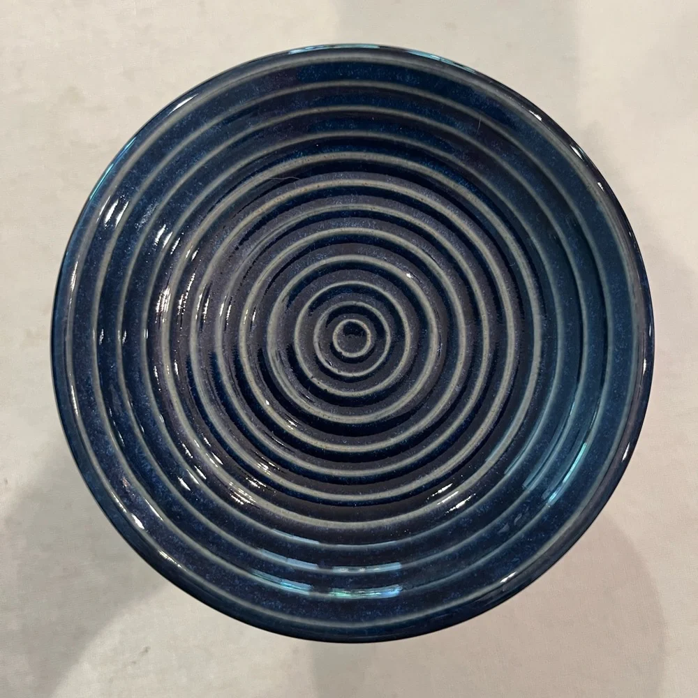 Yankee Candle Dark Navy Blue Chrysanthemum style floral oil warmer.